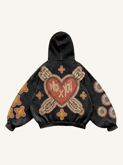 Black men's hoodie with bold heart and chain graphic, floral accents, and 'Me x You' text, clothbros