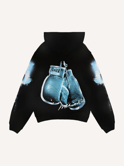 Black hoodie with blue boxing gloves graphic, modern men’s streetwear by clothbros
