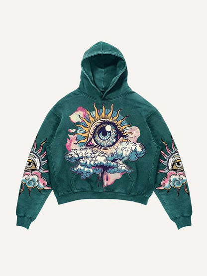 Green men’s hoodie with large all-seeing eye and clouds graphic, modern streetwear style
