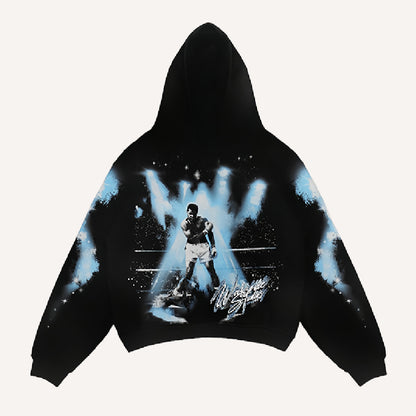 Black men's hoodie with boxing graphic, modern streetwear from clothbros
