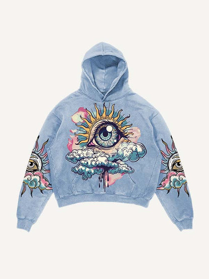 Blue men's hoodie with colorful eye and cloud graphic, modern streetwear by clothbros