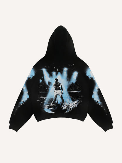 Black hoodie with boxing graphic and blue light accents, modern men's streetwear by clothbros
