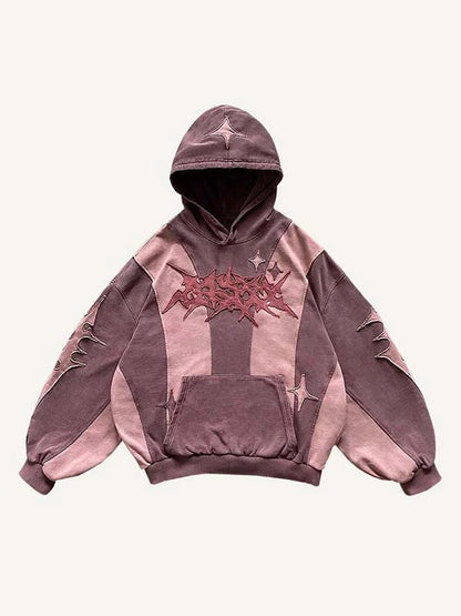 Modern men's graphic hoodie in mauve and pink tones with unique stitched designs, clothbros